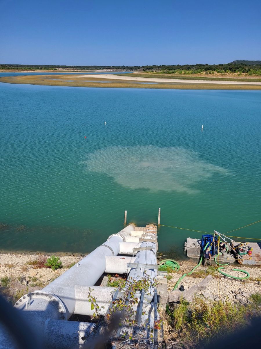 Dredging to remove silt and debris